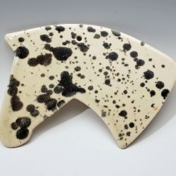 horsehead ornament in splatter glaze
