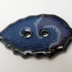 Dark blue leaf button