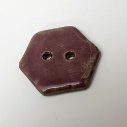 Purple hexagon button