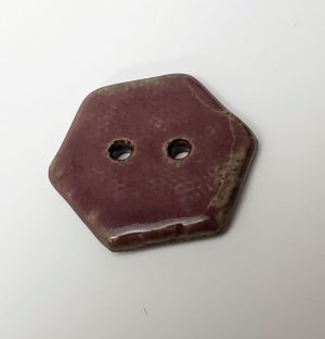Purple hexagon button