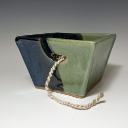 small yarn bowl in dark blue and moss
